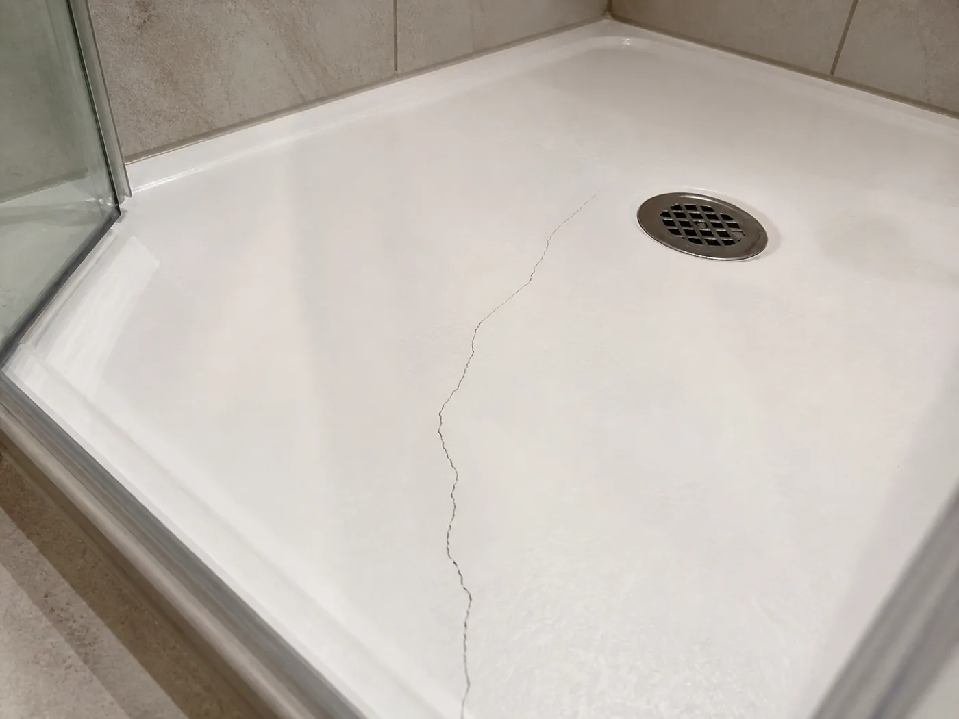 Shower pan crack damage example